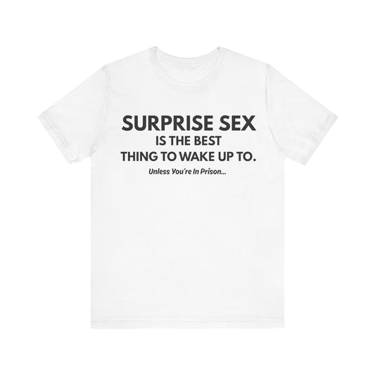 Funny Novelty Tee — "Surprise Sex Is The Best Thing To Wake Up To" Graphic T-Shirt