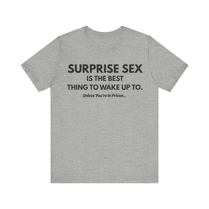 Funny Novelty Tee — "Surprise Sex Is The Best Thing To Wake Up To" Graphic T-Shirt